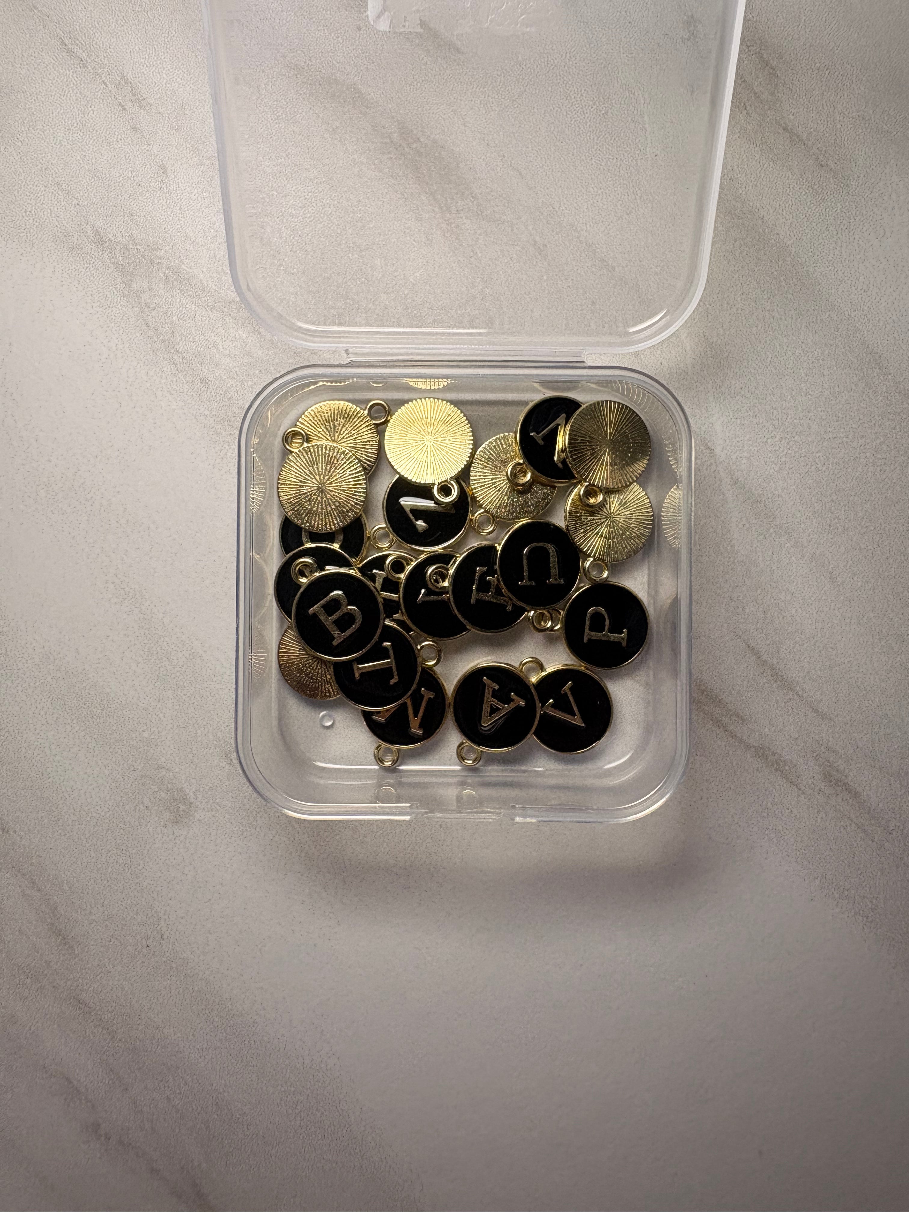 Black and Gold Letter Charm